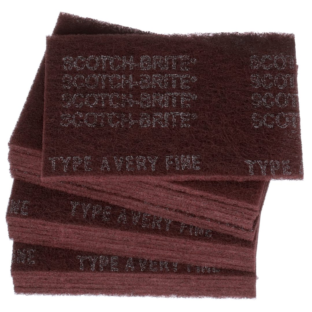 3M Scotch-Brite 7447 general purpose hand pads, maroon very fine non-woven abrasive pads, 6x9 inches, 60 per case.