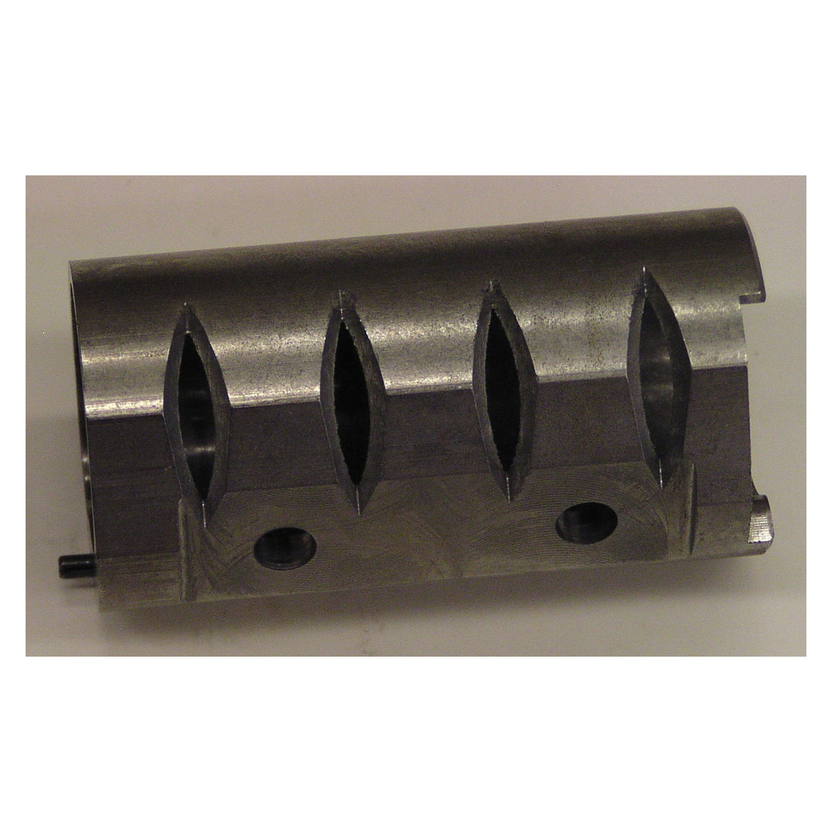 3M AB06563 cylinder part for industrial equipment, shown in the image with detailed labels and metallic finish.