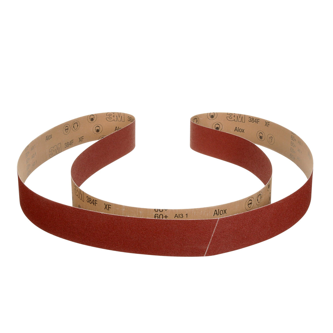 3M 384F 120+ grit 3-inch x 132-inch sanding belt for narrow belt sander, showing abrasive surface and backing material.