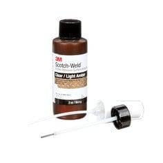 3M Scotch-Weld CA-ACTIVATOR surface activator in light amber, 2 oz bottle, used for instant adhesive activation.