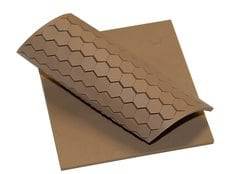 3M Bumpon SJ5201-BRN light brown protective bumpers on smooth surface, showing durable adhesive backing and cushioning design.