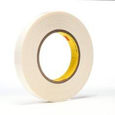 3M 9579 double-sided tape in white, 3/4 inch by 36 yards, 9 mil thick, shown unrolled with adhesive sides visible.