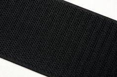 3M SJ3418-3/4X50-BLK flame resistant black loop fastener, 3/4 inch by 50 yards, shown in a close-up image.