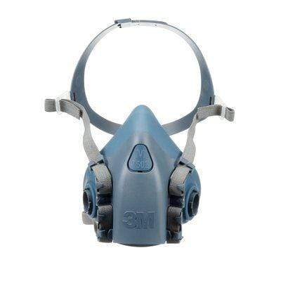3M 7502 half facepiece reusable respirator in medium size with adjustable straps and dual filter ports for respiratory protection.