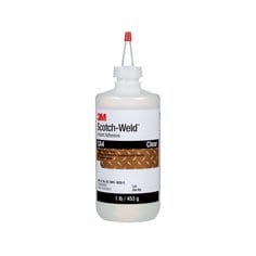 3M Scotch-Weld CA4 instant adhesive in clear, 1 lb (453 g) bottle, suitable for quick bonding of various materials.