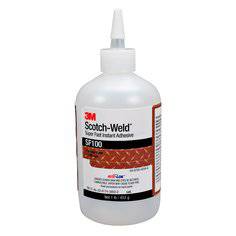 3M Scotch-Weld SF100 super fast instant adhesive in clear, 1 lb (453 g) bottle, designed for quick bonding of various materials.