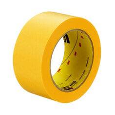 3M Scotch 2460-1.5 inch gold painter's tape on a surface, designed for precise paint edge masking in painting projects.