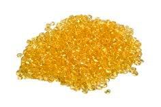 3M Scotch-Weld 3779-B hot melt adhesive pellets in amber, 22 lb case with plastic liner, used for industrial bonding applications.