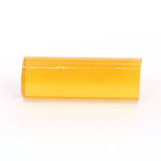 3M Scotch-Weld PG Hot Melt Adhesive 3779-PG in amber, 1 inch by 3 inches, ready for bonding applications.