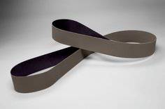 3M Trizact AB66887 belt with 3-1/2 x 15-1/2 inch size, A45 grit aluminum oxide, heavy cotton backing, used for polishing and finishing.