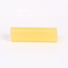 3M Scotch-Weld 3738-TC tan hot melt adhesive in 5/8 inch by 2 inch size, shown in a close-up image.