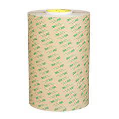 3M 467MP-11 clear adhesive transfer tape, 2 mil thick, 11-3/4 inch by 180 yards, shown applied on a surface for bonding.