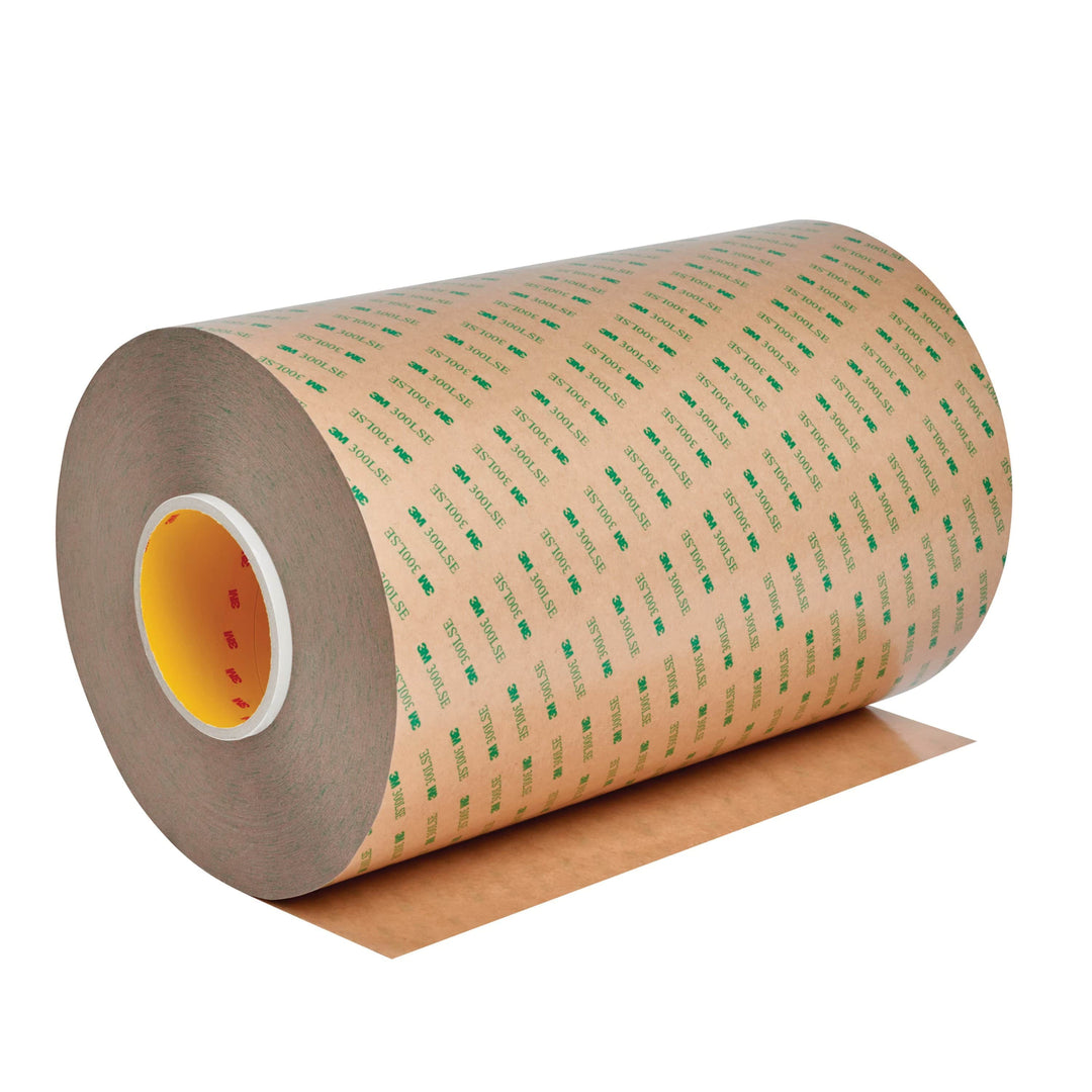 3M 9471LE clear adhesive transfer tape, 27-inch by 180-yard roll, 2 mil thickness, used for bonding and mounting applications.