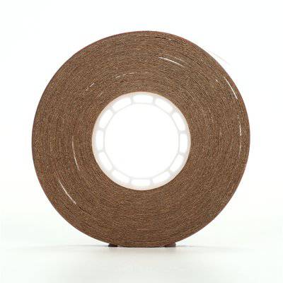 3M Scotch 969 ATG Adhesive Transfer Tape, clear 5 mil, 1/4 inch x 18 yards, shown on a roll with application surface.