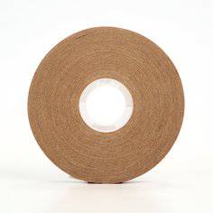 3M Scotch 976-1/2X60 clear ATG adhesive transfer tape, 2 mil, 1/2 inch wide, shown rolled and ready for application.