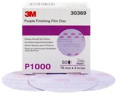 3M 30369 3-inch aluminum oxide 1000 grit Velcro finishing disc for sanding and polishing surfaces.