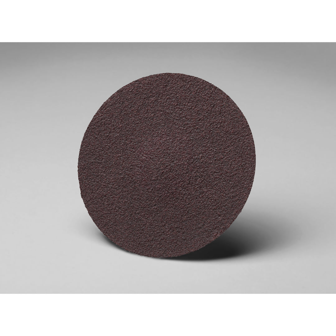 3M P180xf 361F Ite RB Clo 3-inch quick change disc with no hole, shown on a sanding tool, designed for surface finishing.