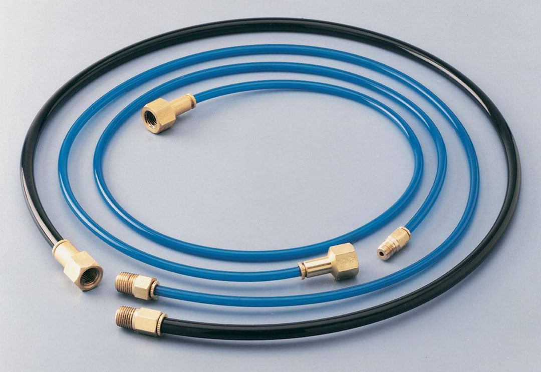 Dynabrade 96224 air hose, 1/4 inch ID x 3/8 inch OD, flexible rubber hose for air tools, shown coiled and ready for use.
