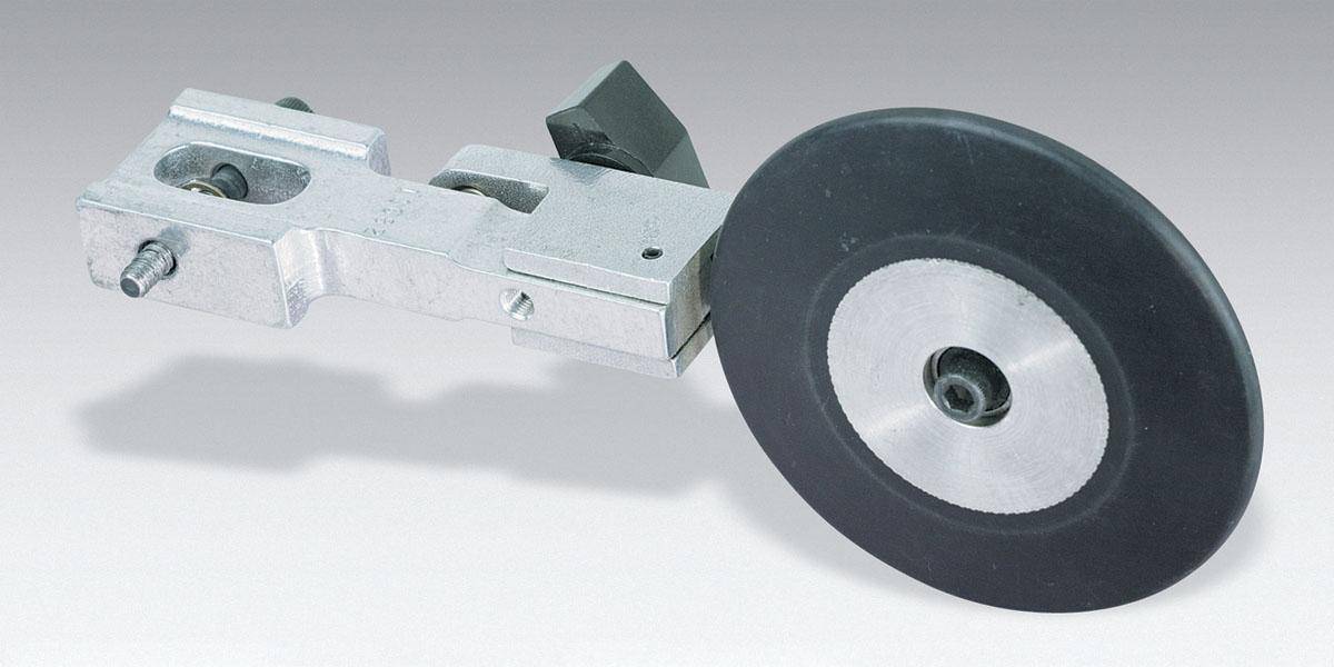 Dynabrade 67211 utility arm with 4x1/2 inch diameter and 70 duro rubber for tight radius applications.