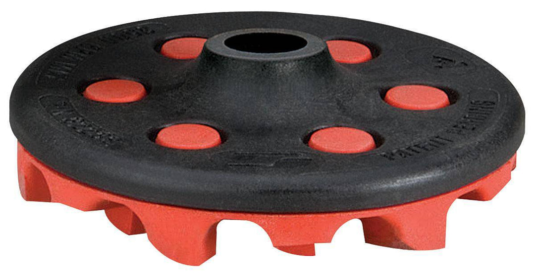 Dynabrade 92295 4-inch diameter backup pad with red-tred eraser disc assembly for surface polishing and finishing.