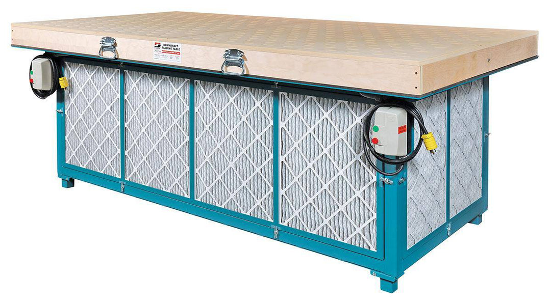 Dynabrade 64657 downdraft sanding table with 48x96 inch work surface for dust collection and sanding applications.