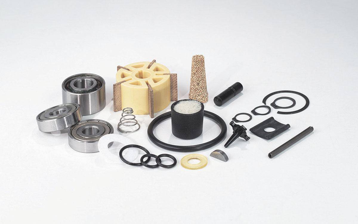 Dynabrade 96480 tune-up kit with various tools and parts for power tool maintenance and performance enhancement.