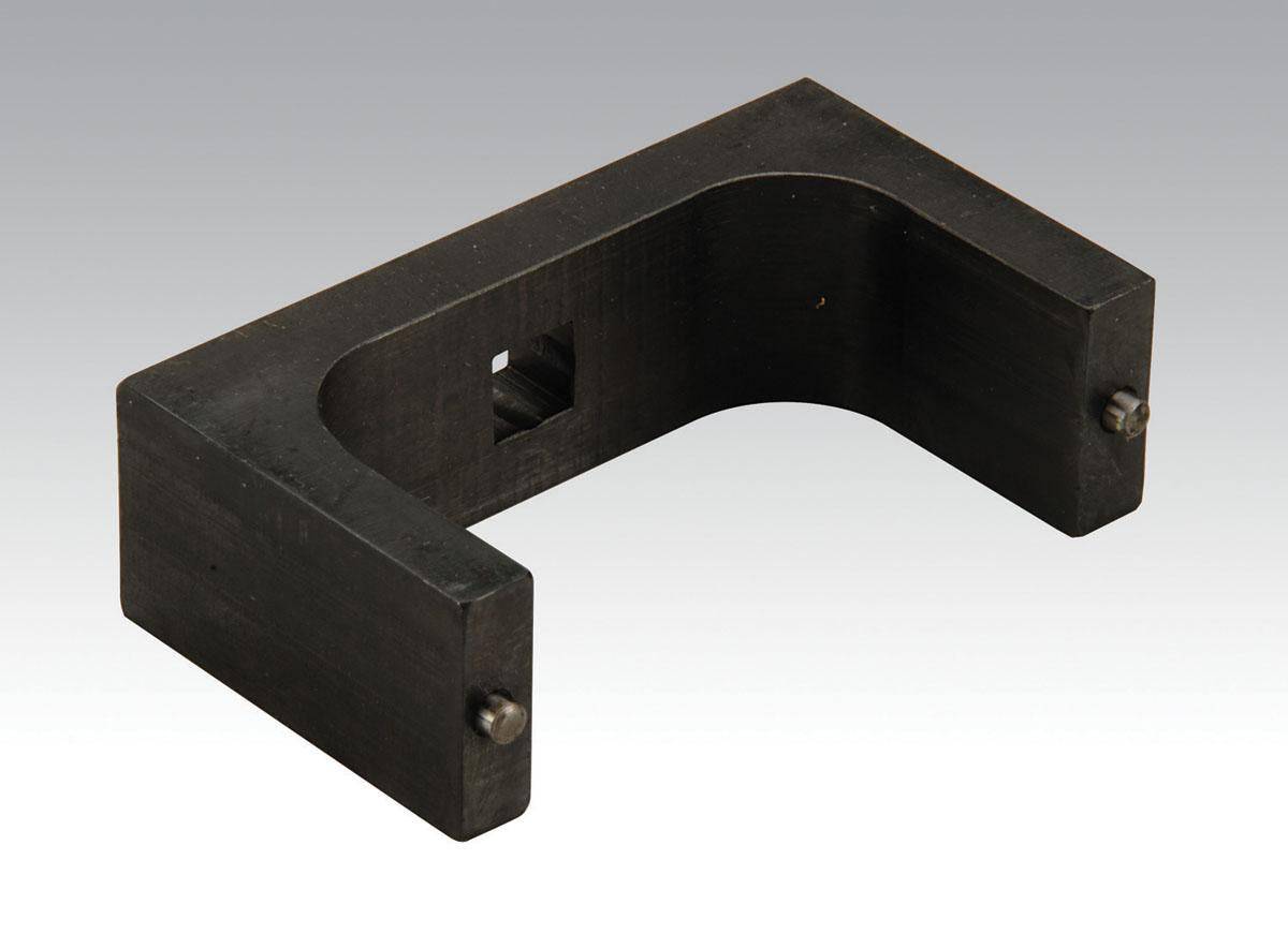 Dynabrade 56599 wrench assembly showing a close-up of the wrench with metal construction and ergonomic handle design.
