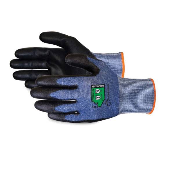 Superior Glove TenActiv cut-resistant reusable gloves with black polyurethane-coated palms in blue, size 10.